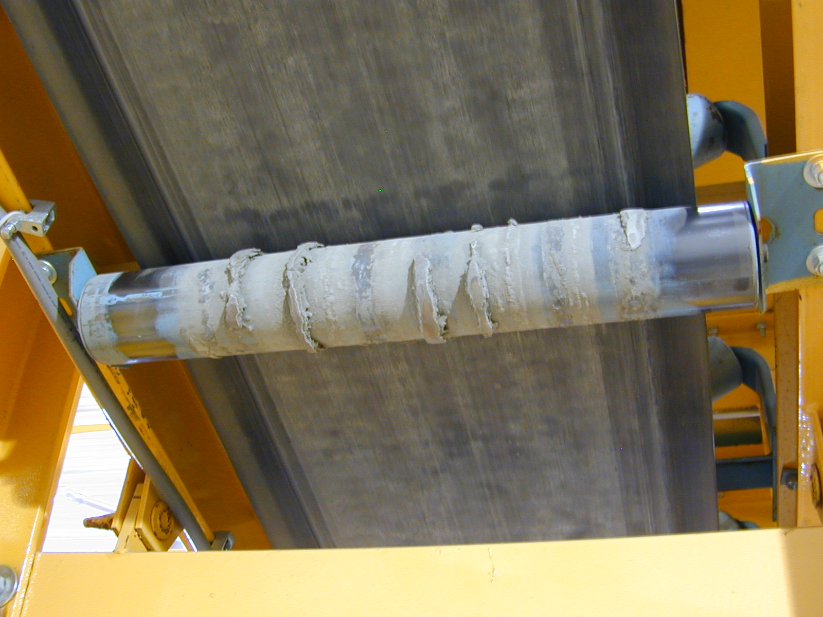 Conveyor steel showing corrosion at welds before coating