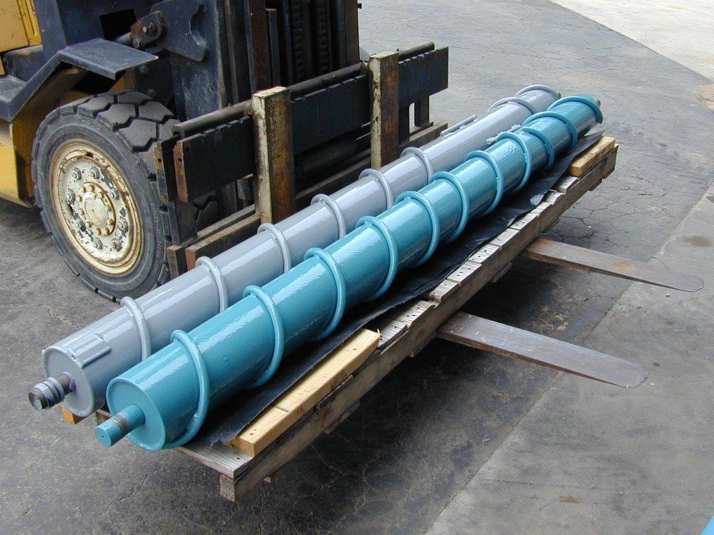 Sugar beet harvester coated with protective polyurea