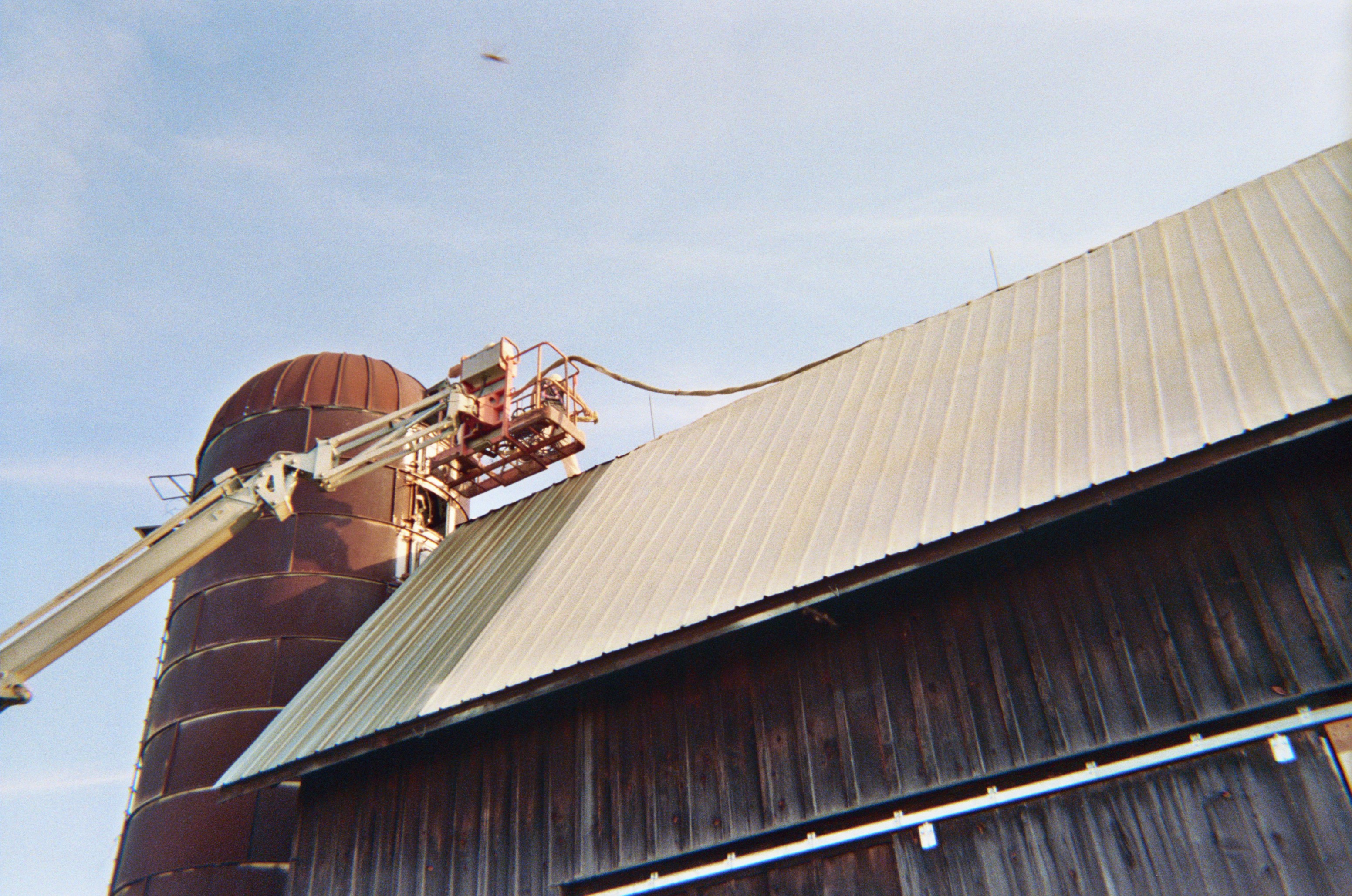 Agricultural metal barn roof coated for rust prevention