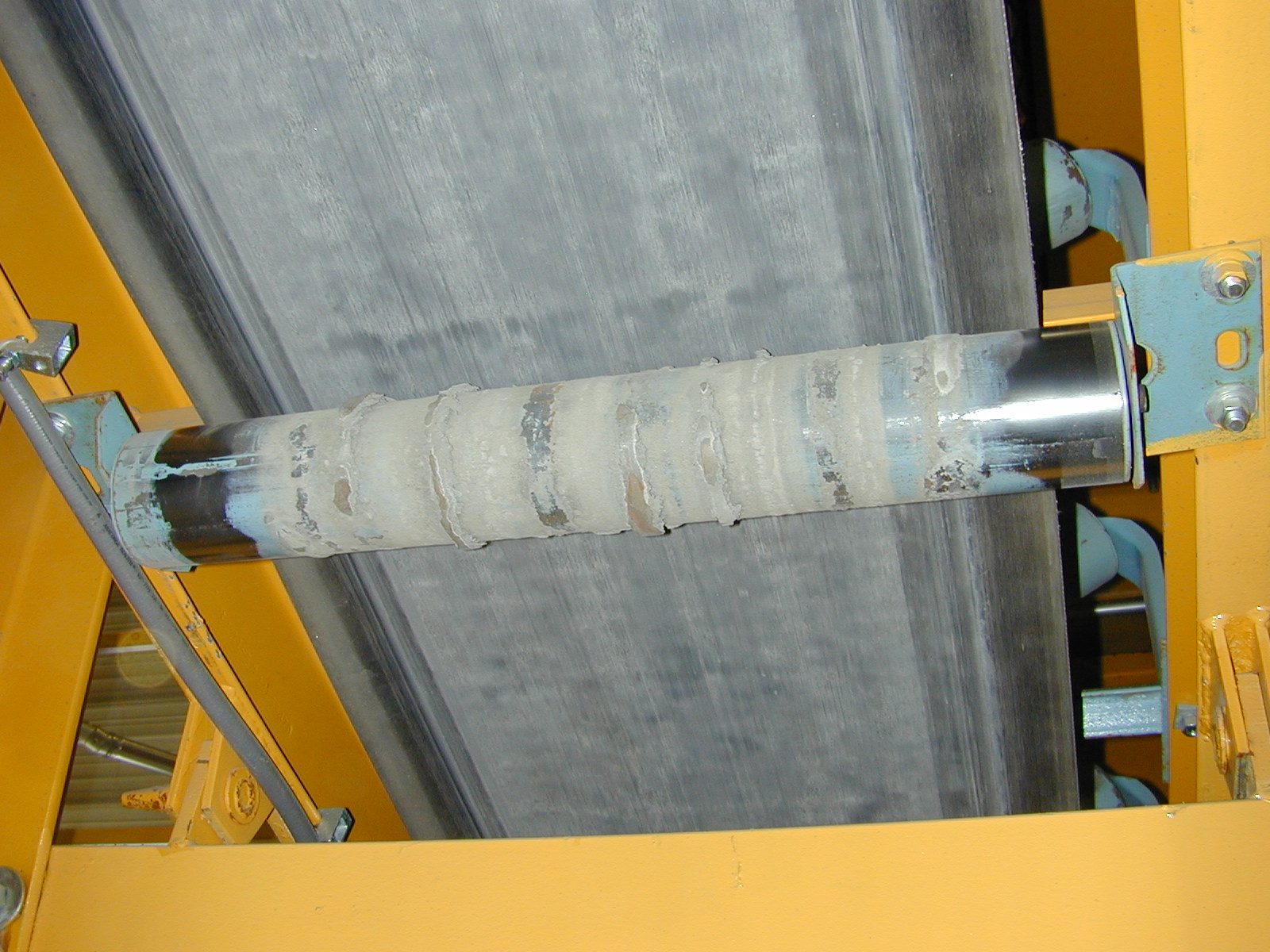 Corroded steel conveyor frame before polyurea rust proof coating