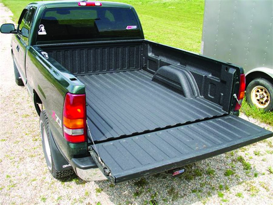 Completed polyurea rust proof coating on a work truck